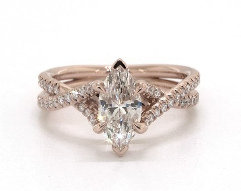 twisting shank engagement ring - marquise-cut diamonds