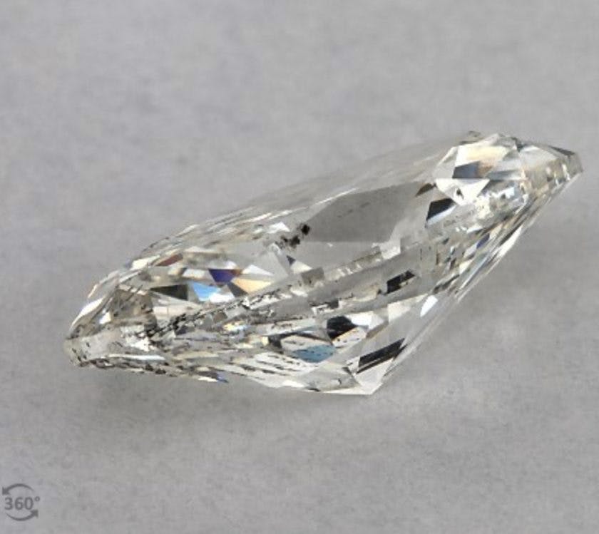 I1 clarity marquise-cut diamond with inclusions near corner