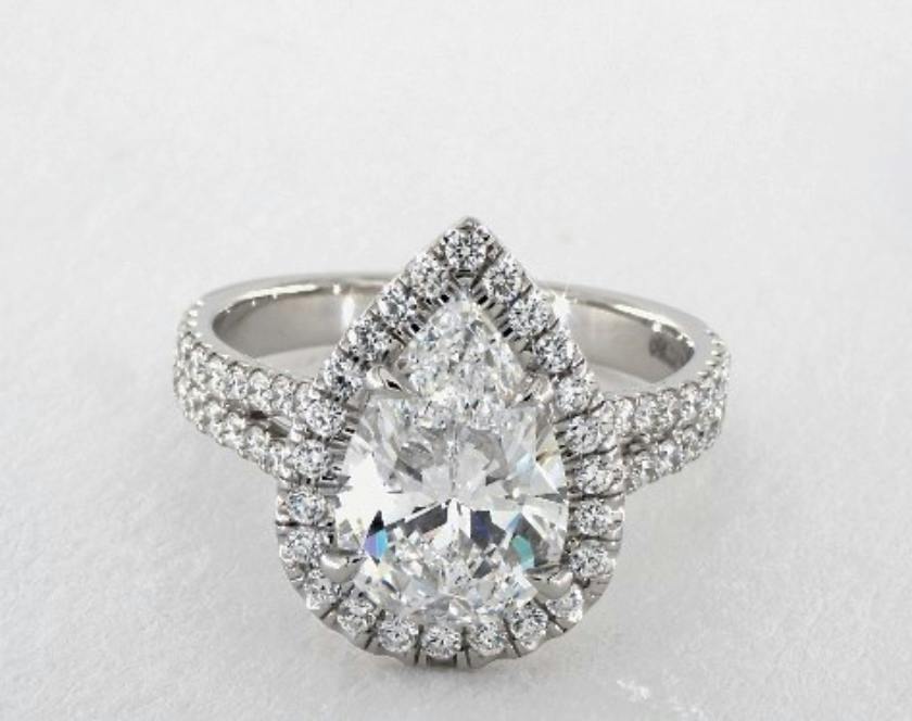pear-cut halo engagement ring - three-carat diamond guide