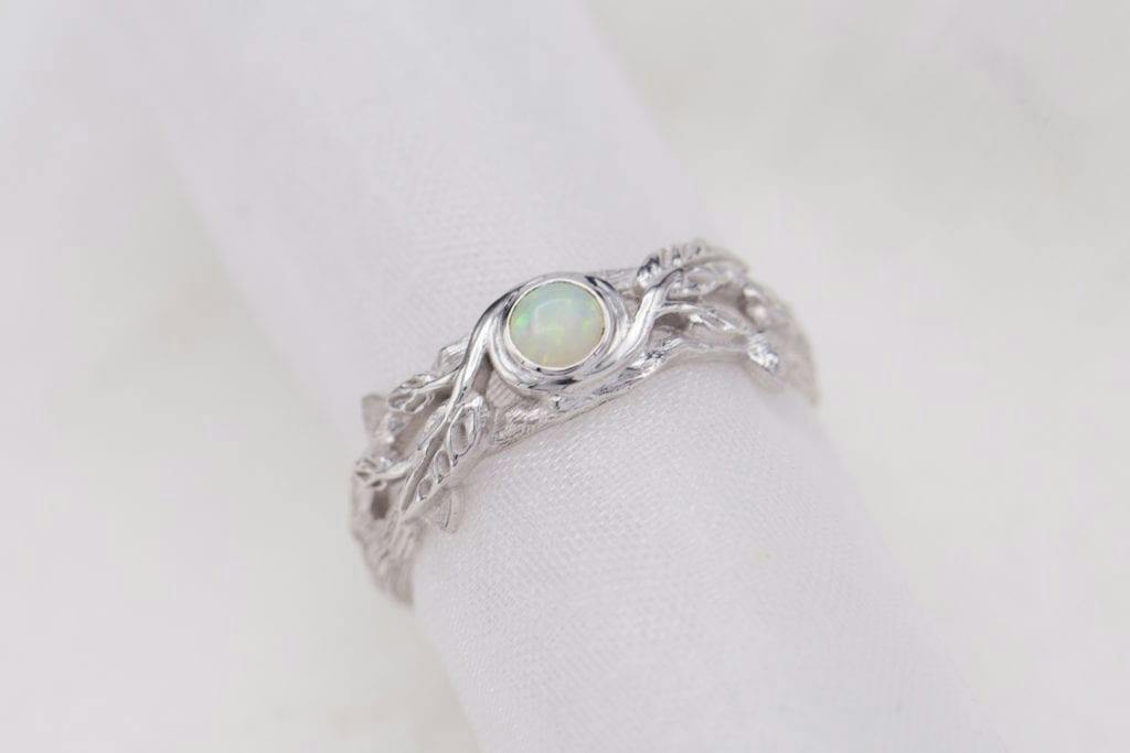 white opal in nature-inspired ring - opal engagement ring stone