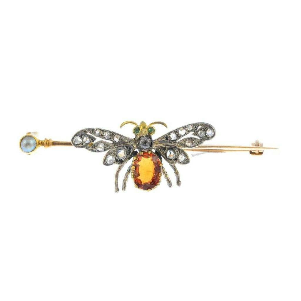 insect brooch with spessartite, tsavorites, and diamonds