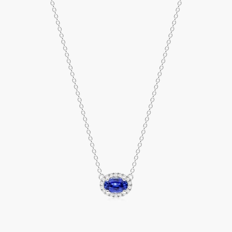 18K White Gold East West Set Oval Halo Sapphire and Diamond Necklace (6.0x4.0mm)