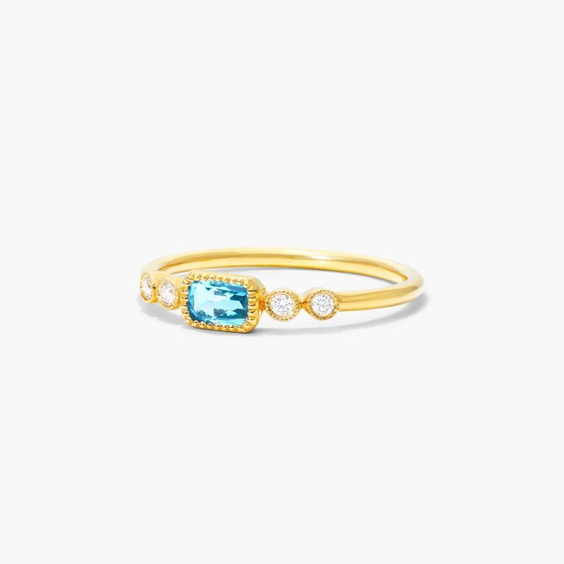 14K Yellow Gold Dainty Blue Topaz Bezel Diamond Ring by Brevani