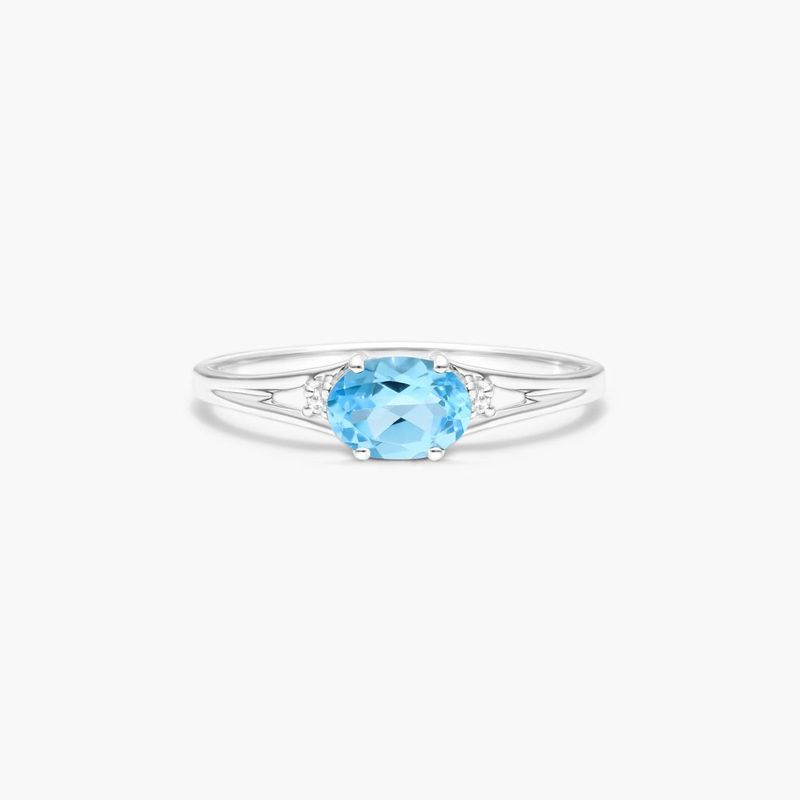 14K White Gold Oval Blue Topaz and Diamond Accent Birthstone Ring