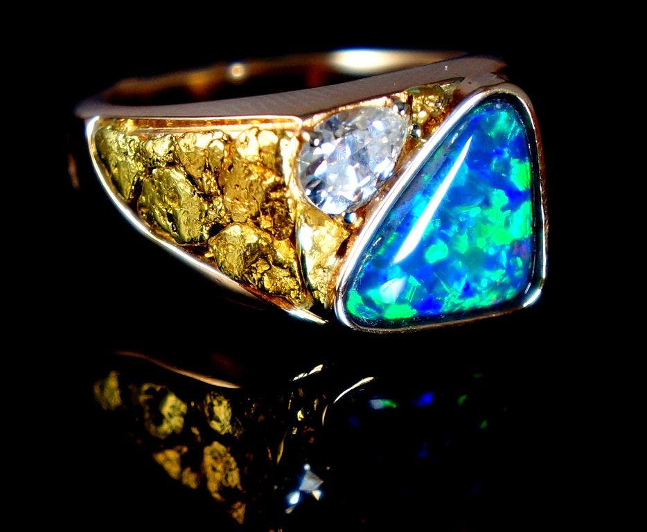 black opal and moissanite ring