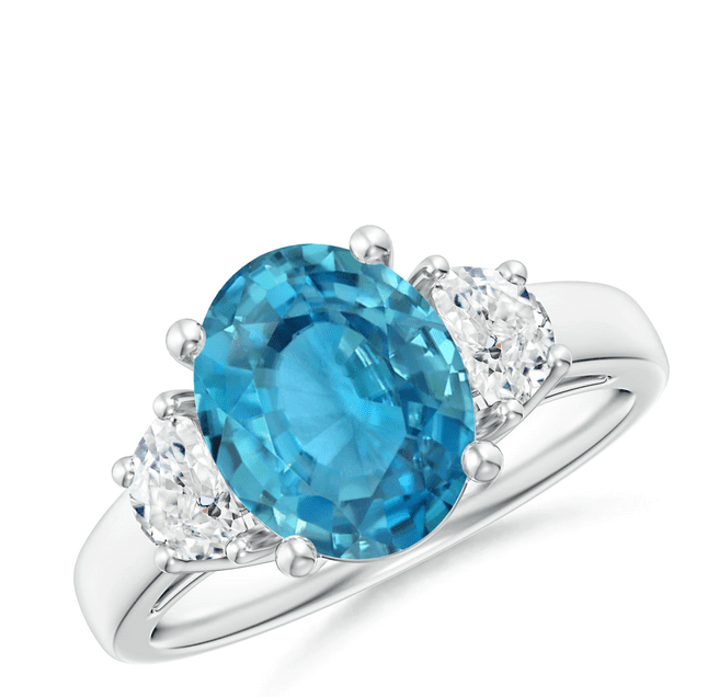 GIA Certified Three Stone Oval Blue Zircon and Half Moon Diamond Ring Angara