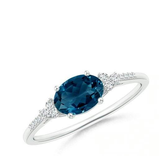Horizontally Set Oval London Blue Topaz Ring with Diamonds Angara