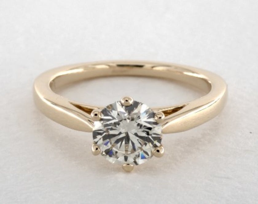 K color solitaire engagement ring