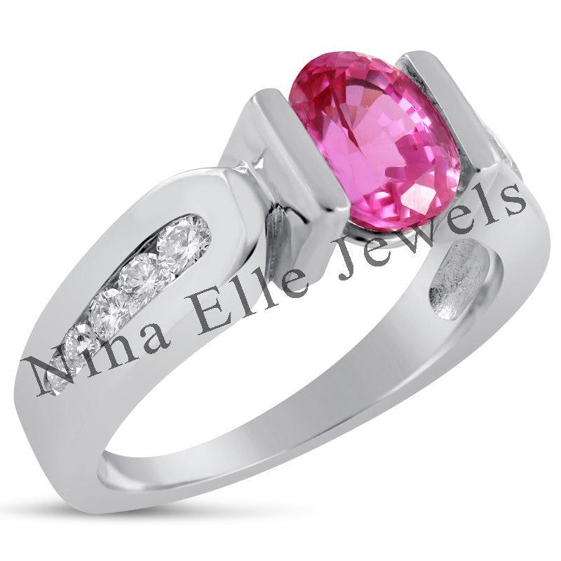 tension-style setting featuring pink sapphire - protective gem settings