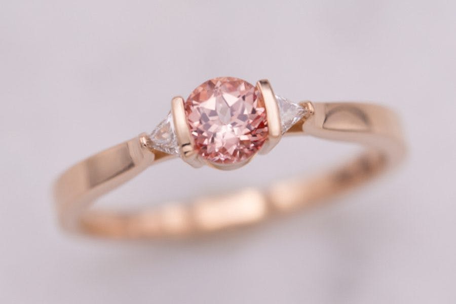 trillion-cut diamond in three-stone setting - engagement ring setting