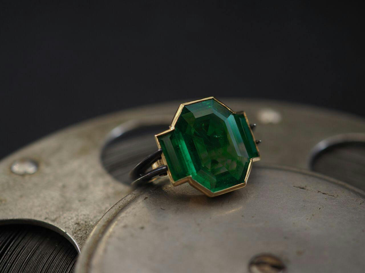 old mine emerald in a modern ring - emerald buying guide