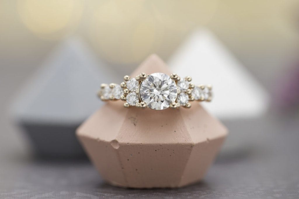 round diamond in rose gold engagement ring