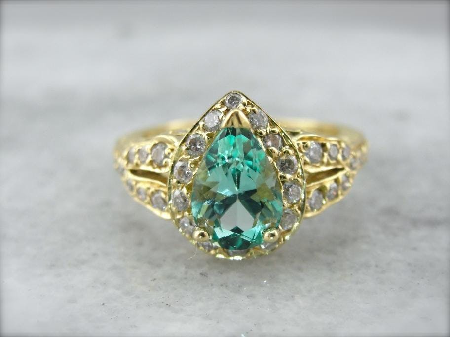 light tone bluish green - emerald engagement ring stone