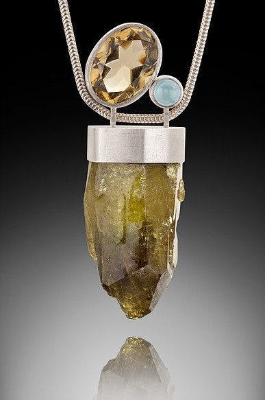 raw stone jewelry design and care - idocrase pendant