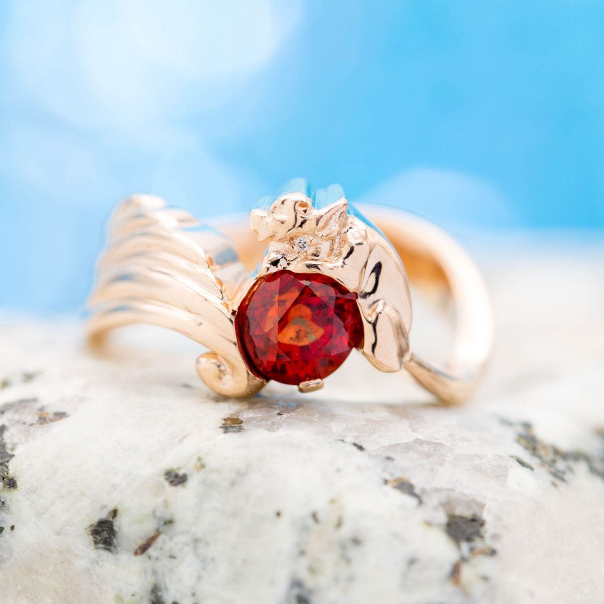 orange-red ruby engagement ring